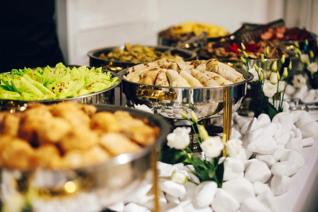 Catering spread of Yemeni dishes for an event